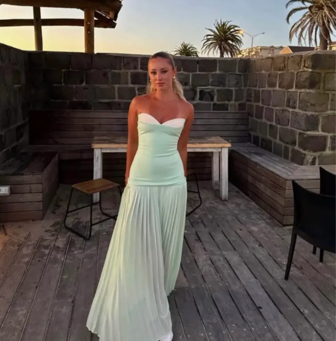 She is OLLÁ Nicolette Maxi Dress Green Size 8 for rent on The Volte - main image