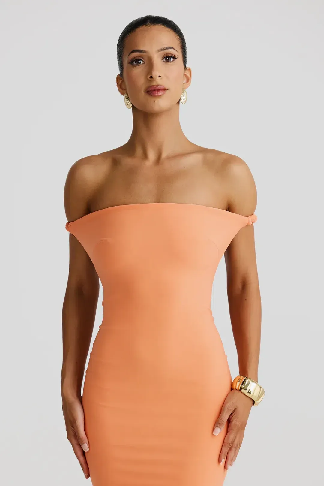 Melani The Label Maia Maxi Dress in Papaya Size S AU 8 for rent on The Volte - main image
