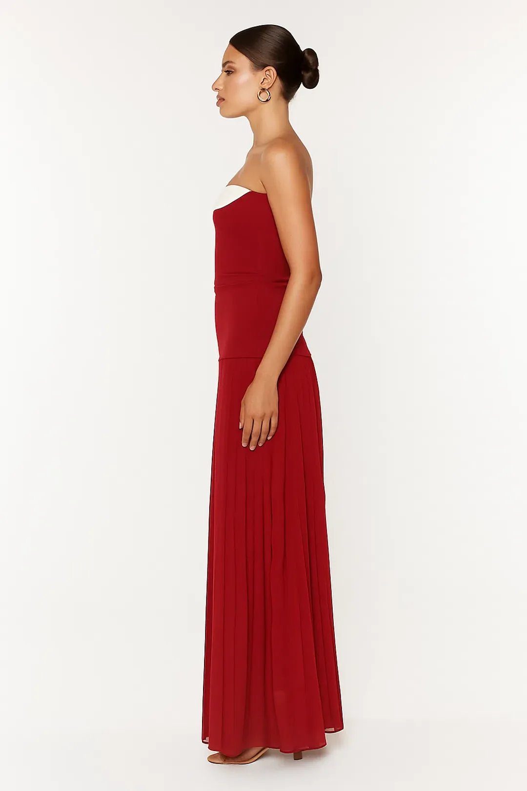 She is OLLÁ Nicolette Maxi Dress in Raspberry Size 6 for rent on The Volte - main image