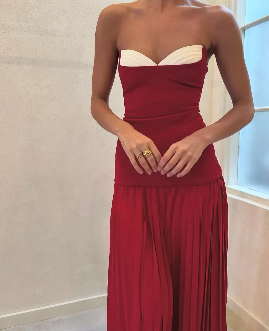 She is OLLÁ Nicolette Maxi Dress in Raspberry Size 6 for rent on The Volte - main image