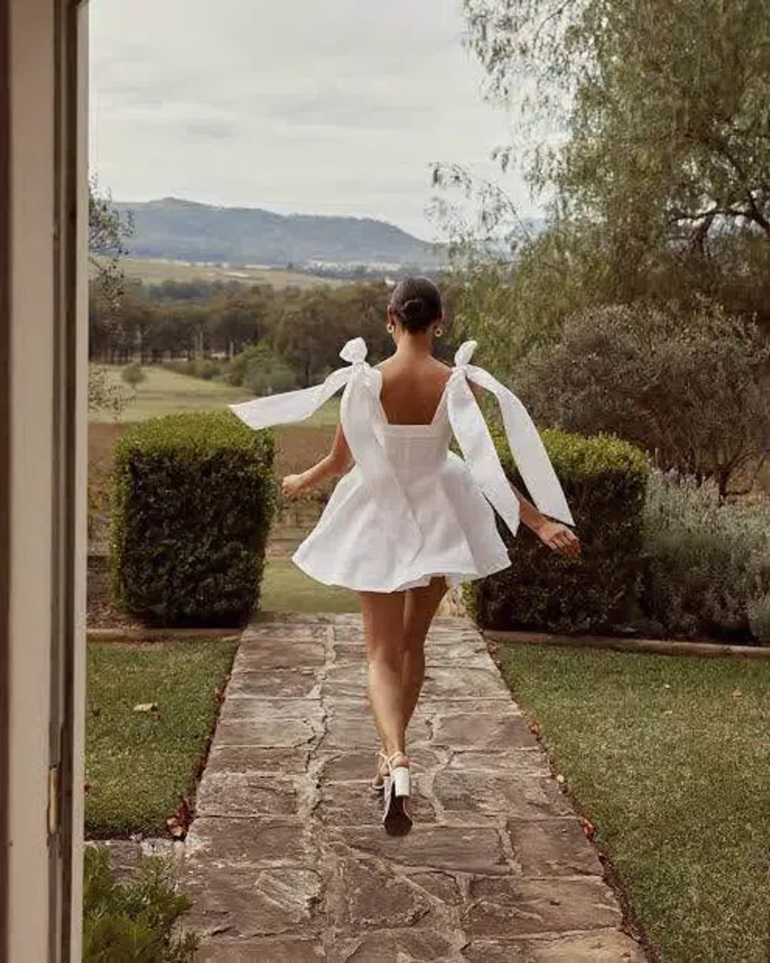 Dissh Aisle Linen Bow Tie Shoulder Mini Dress White Size AU 10 for rent on The Volte - main image