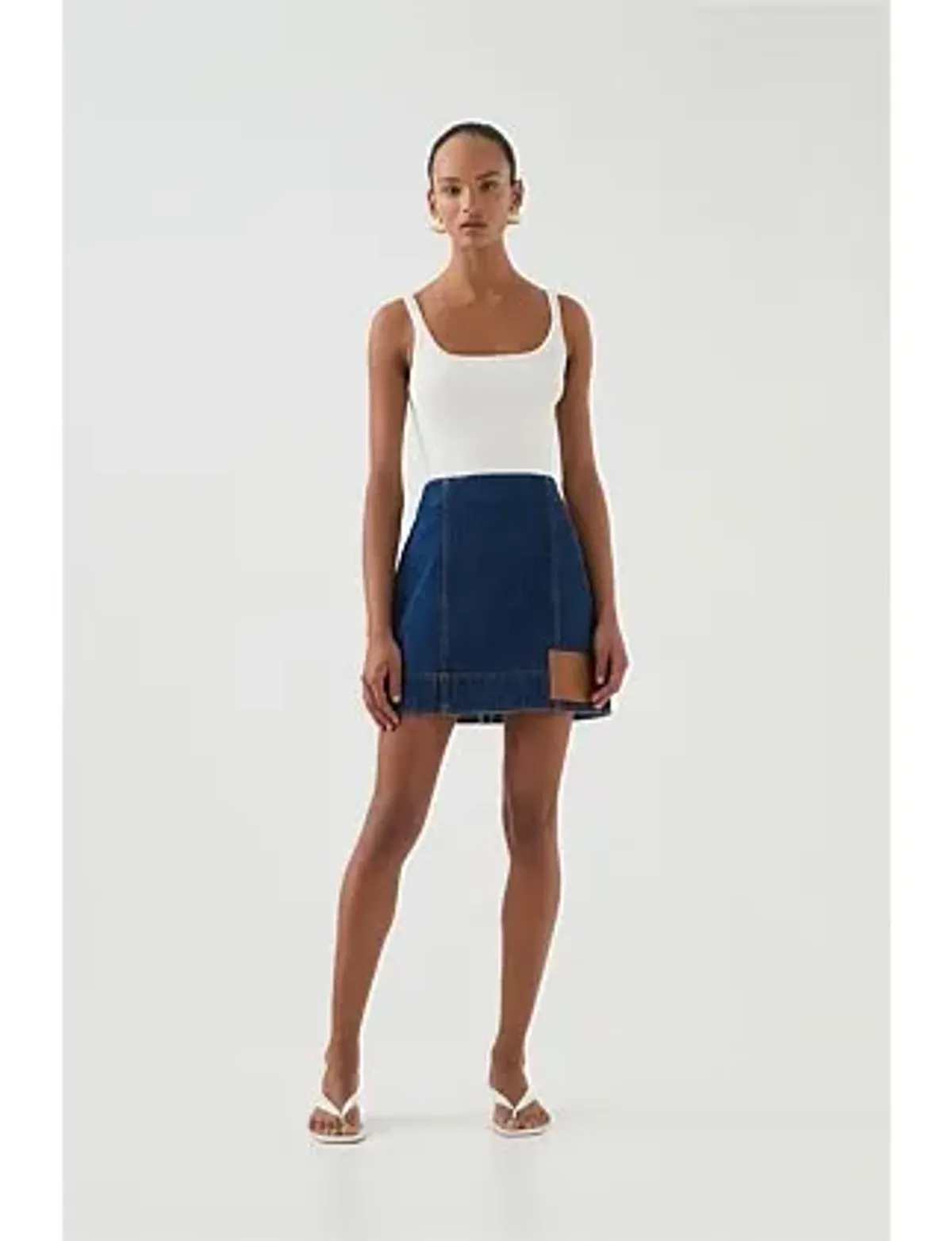 Aje Carmen Denim Mini Skirt Denim Size 6 for rent on The Volte - main image