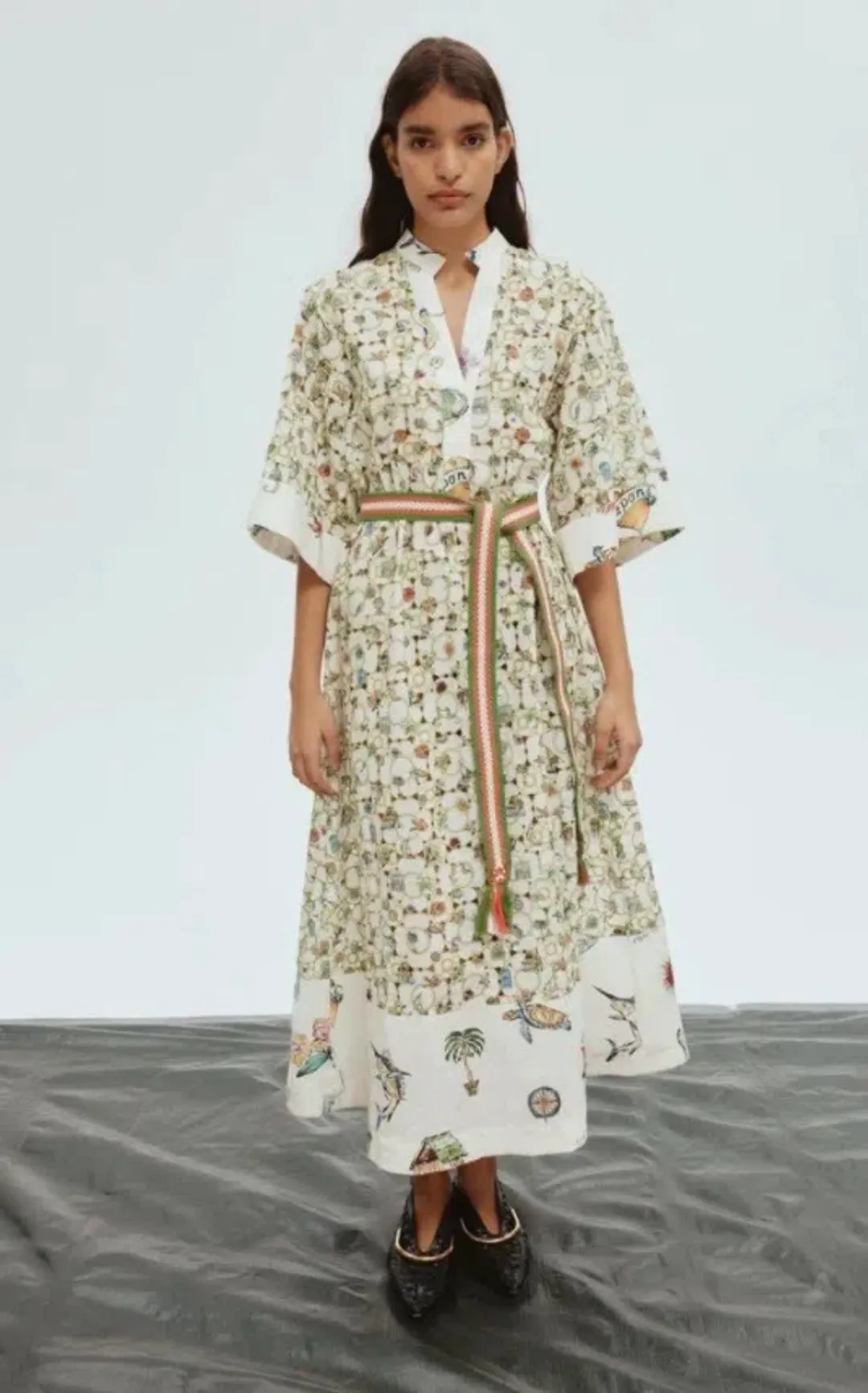 Alemais Sunset Broderie Midi Dress Size 10 fits 12 & 14 with striking belt for rent on The Volte - main image