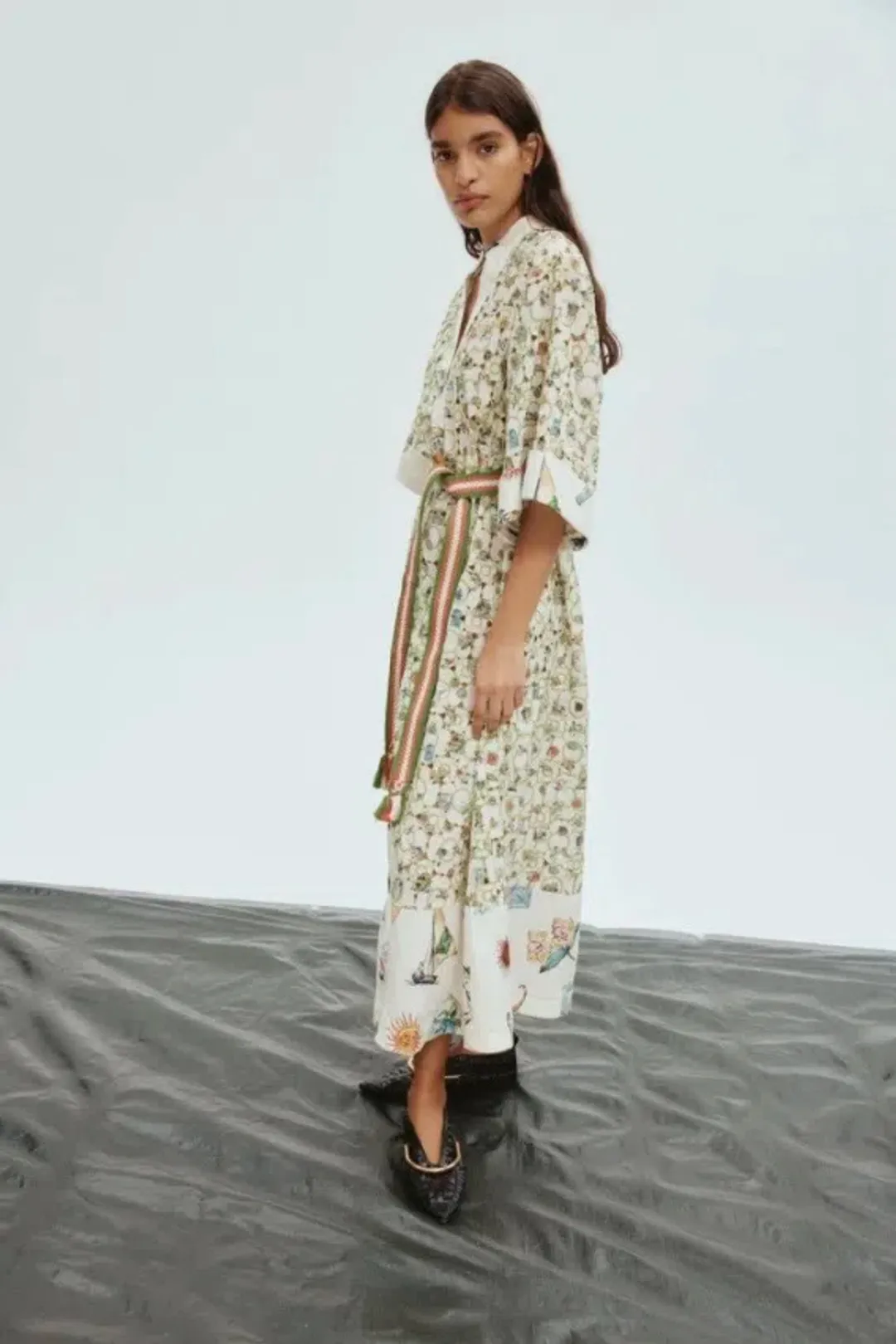 Alemais Sunset Broderie Midi Dress Size 10 fits 12 & 14 with striking belt for rent on The Volte - main image