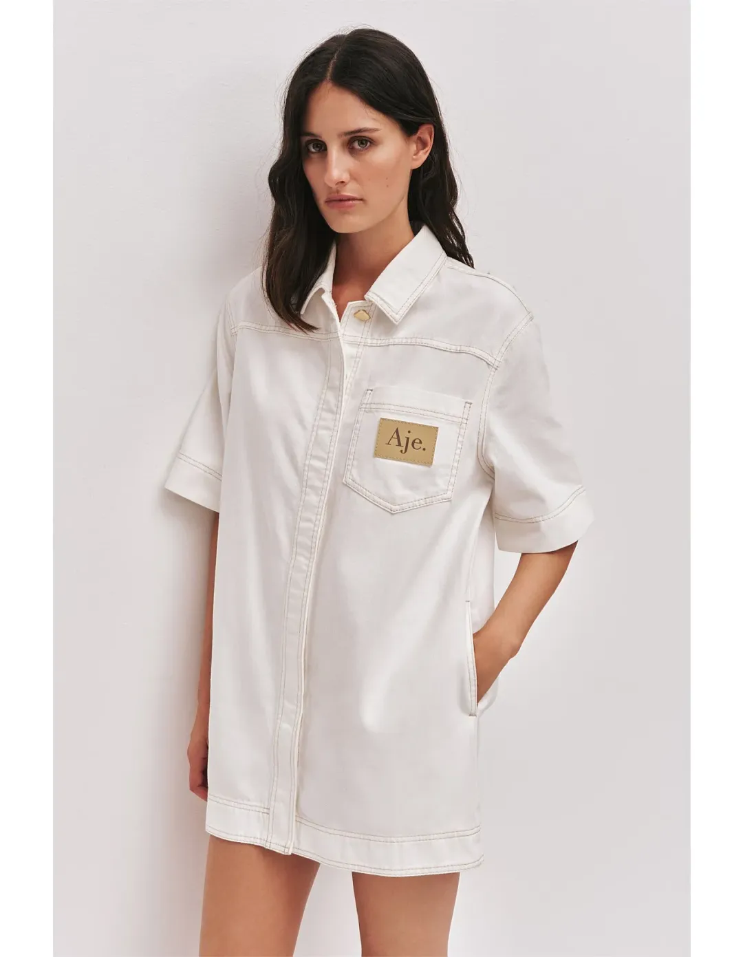Aje Studio Lumi Denim Mini Tunic Dress Cream Size 12 for rent on The Volte - main image