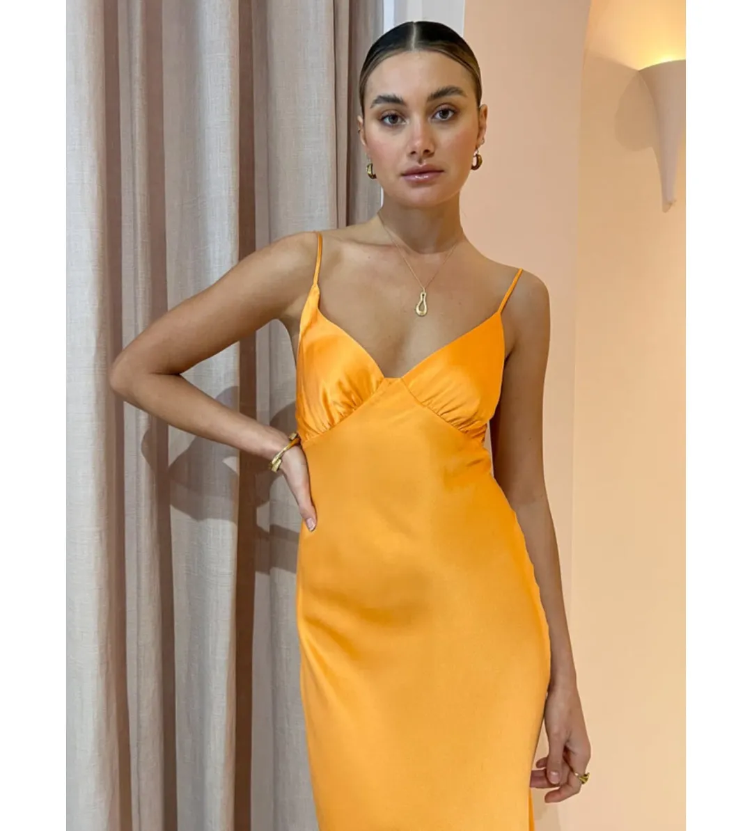 Bec & Bridge Amber V Maxi Dress in Nectarine Orange Size 8 for rent on The Volte - main image