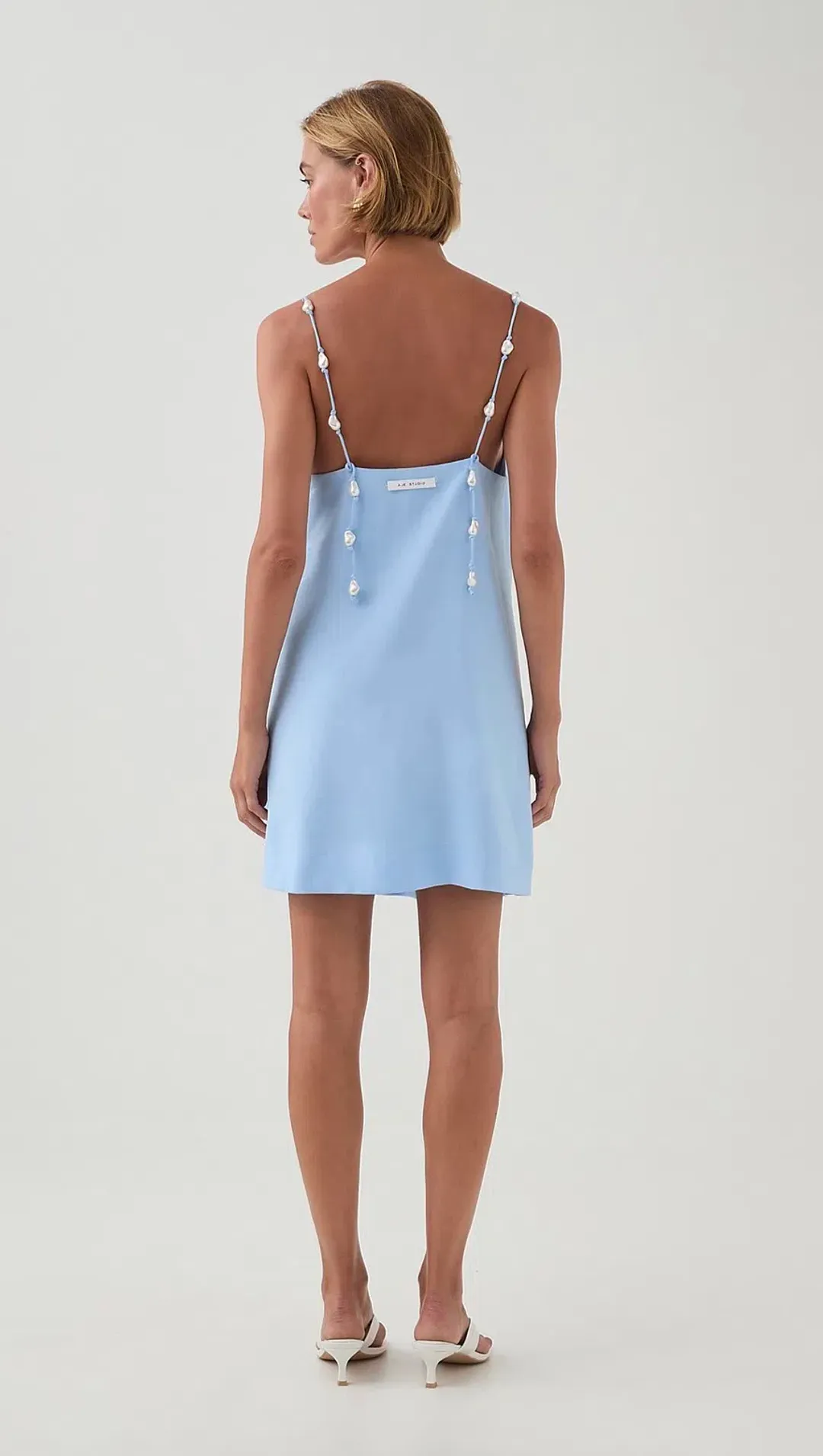 AJE AKOYA MINI DRESS for rent on The Volte - main image