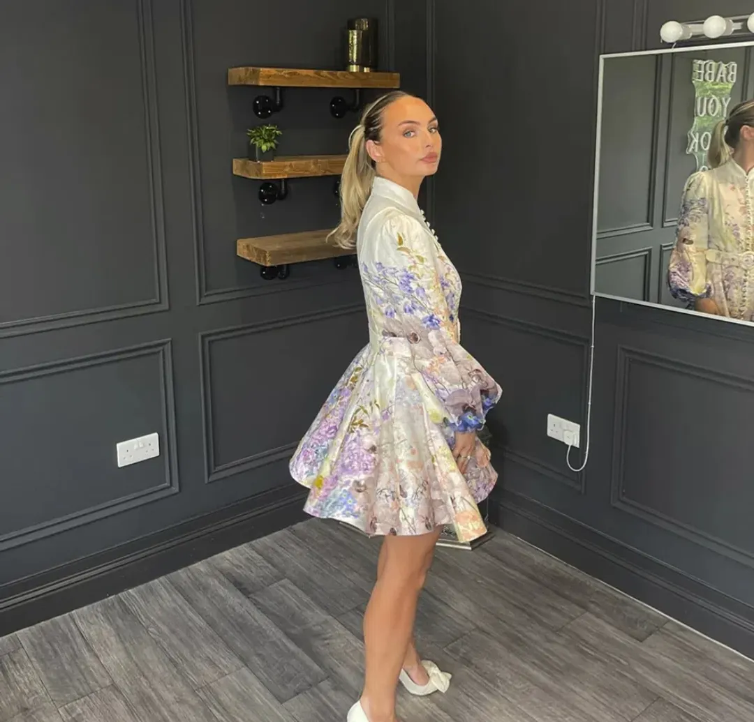 Zimmermann Rhythmic Buttoned Mini Dress in Floral Size 2 AU 12 for rent on The Volte - main image