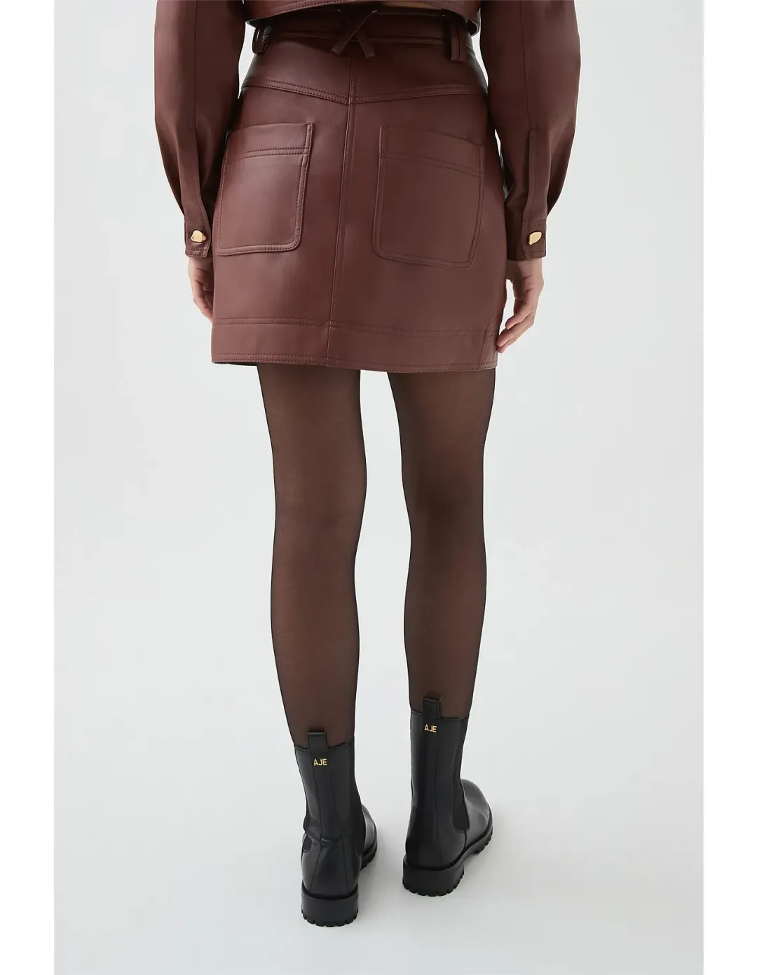 Aje Sarina Mini Skirt Size 8 Toffee for rent on The Volte - main image