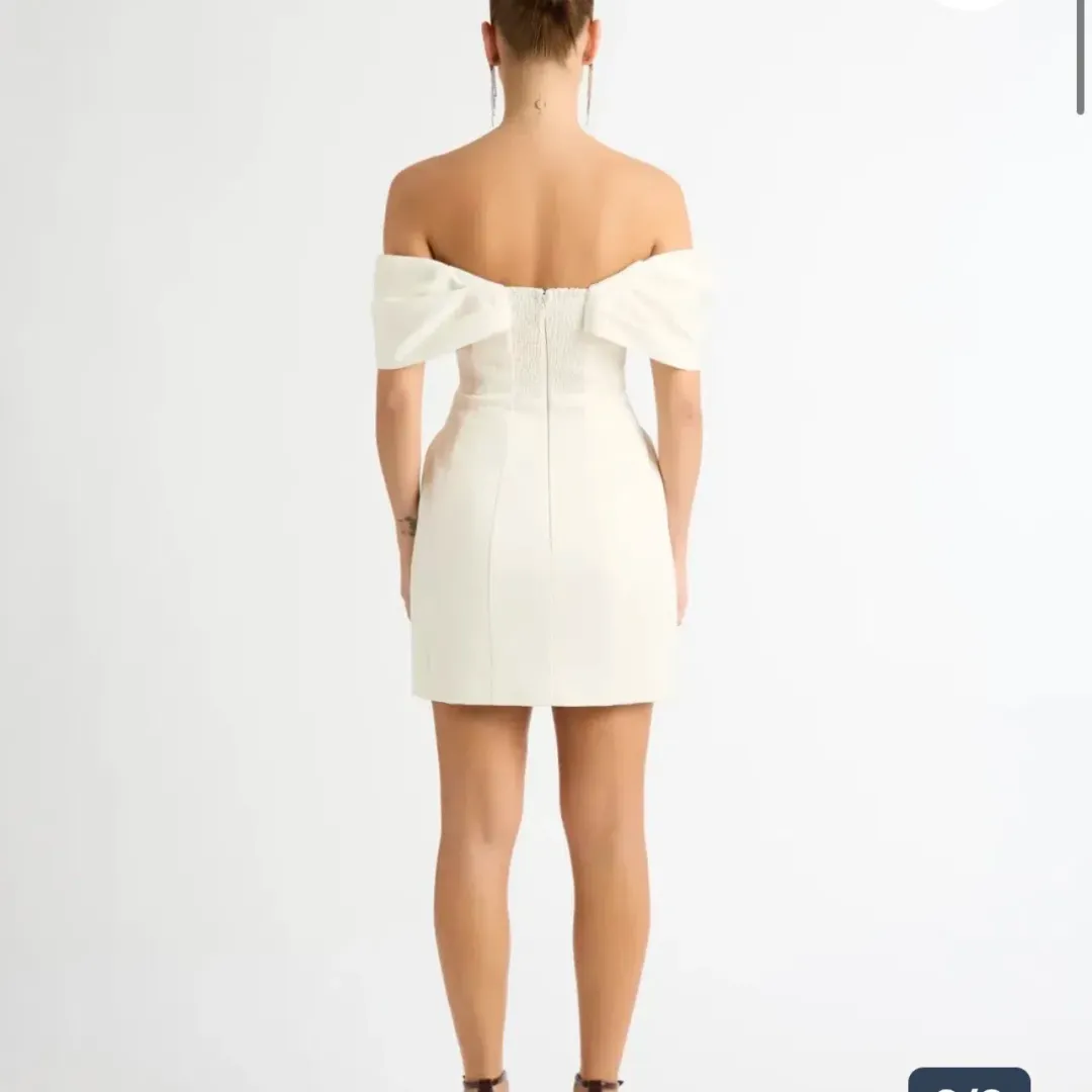 SHEIKE NOUR CREAM MINI DRESS IN WHITE SIZE AU 16 for rent on The Volte - main image