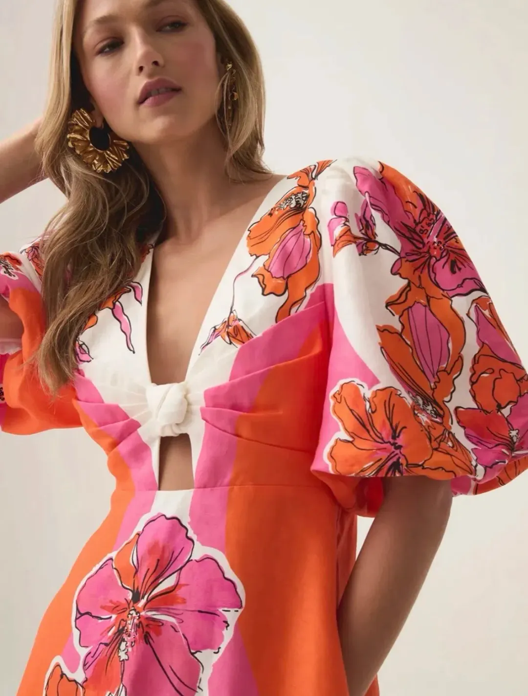 Aje Overflow knotted midi dress- Vibrant Hibiscus for rent on The Volte - main image