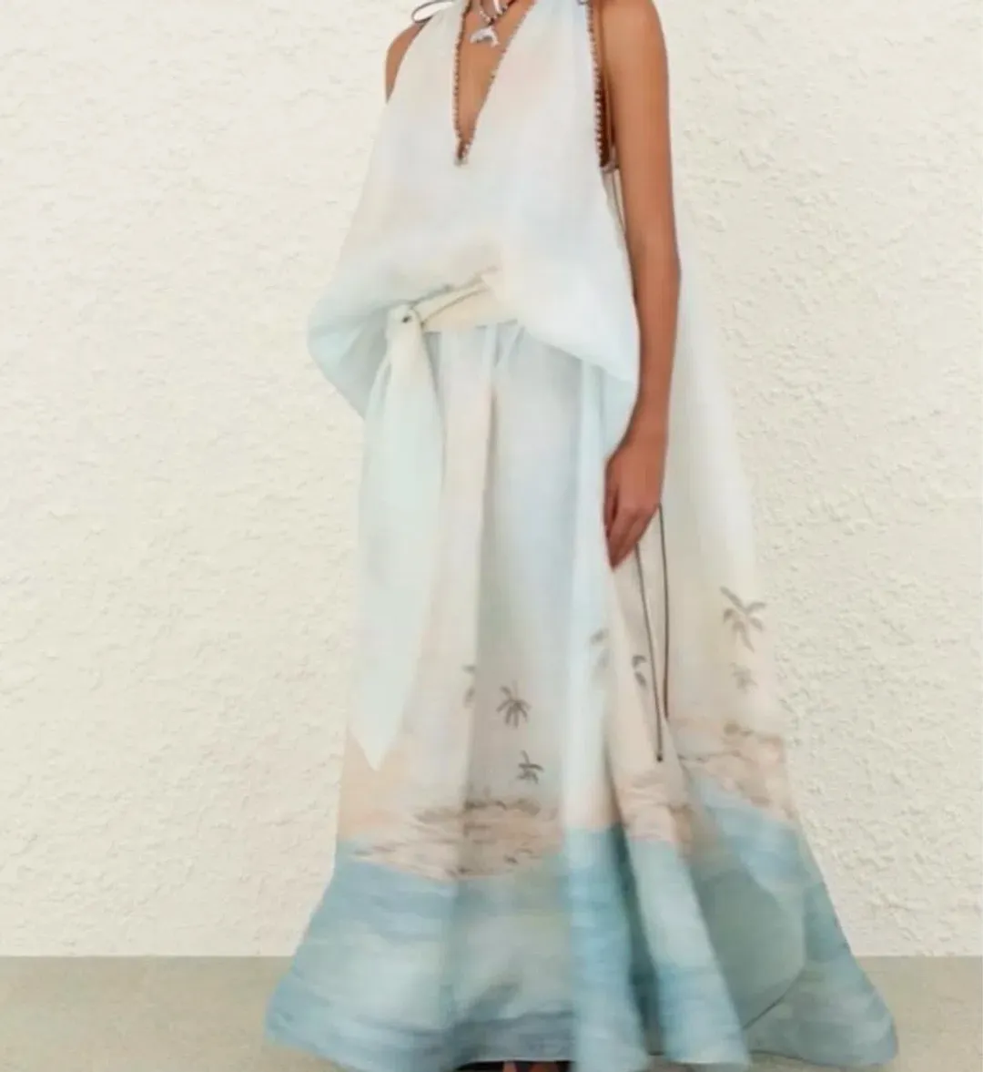 Zimmermann Illuminate plunge gown features a scenic palm tree print and beaded neckline details for rent on The Volte - main image