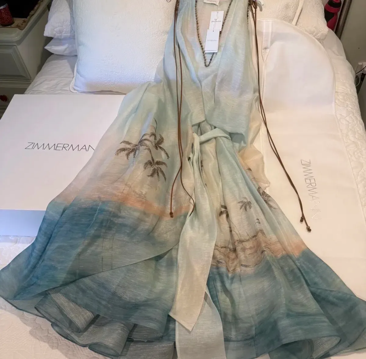 Zimmermann Illuminate plunge gown features a scenic palm tree print and beaded neckline details - Image 6
