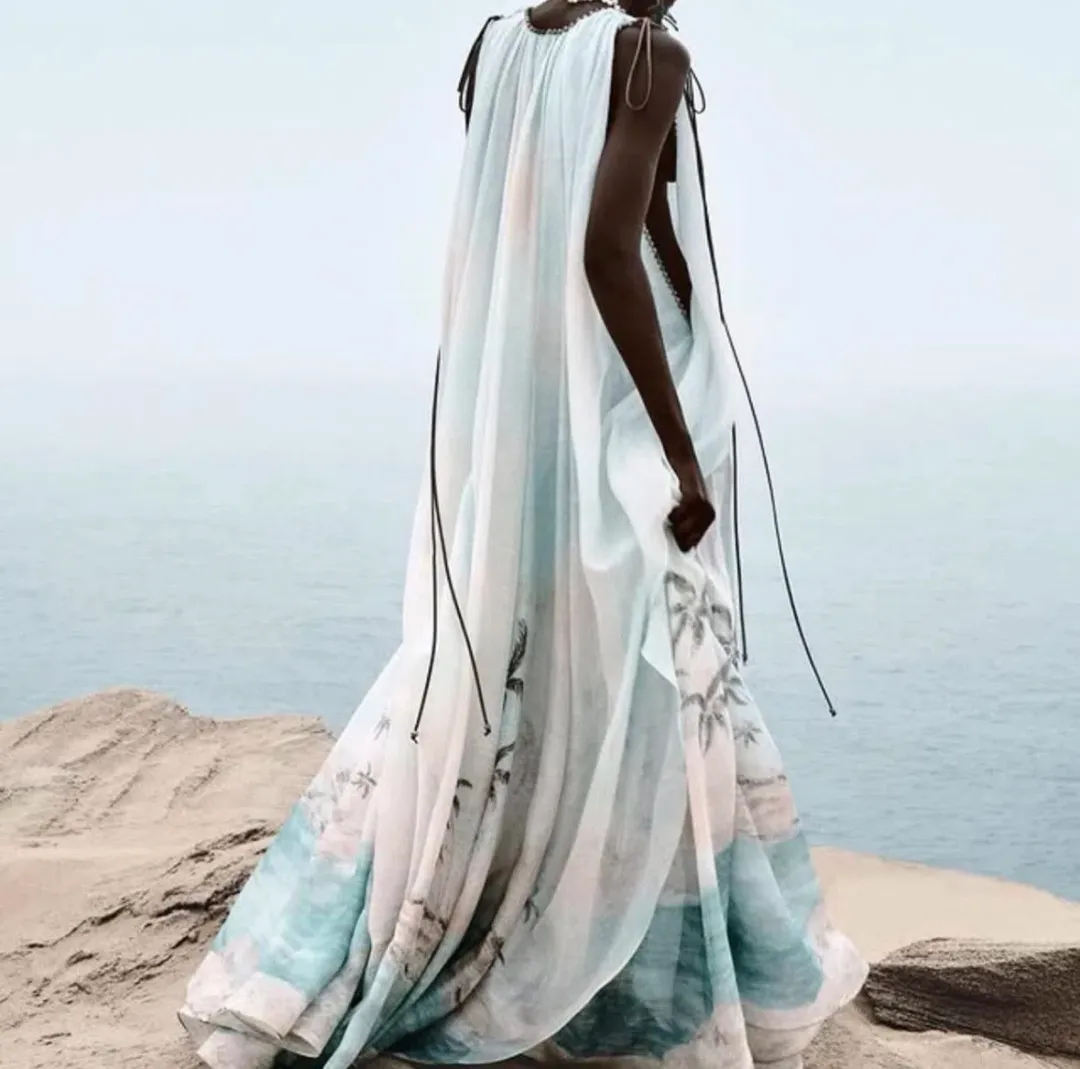 Zimmermann Illuminate plunge gown features a scenic palm tree print and beaded neckline details for rent on The Volte - main image