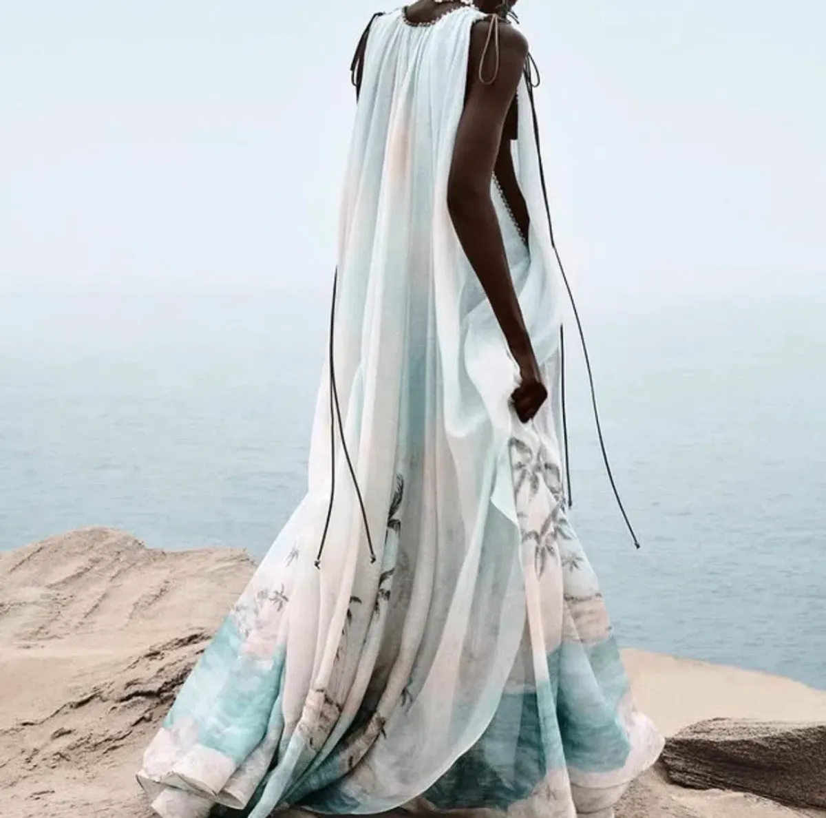 Zimmermann Illuminate plunge gown features a scenic palm tree print and beaded neckline details - Image 2