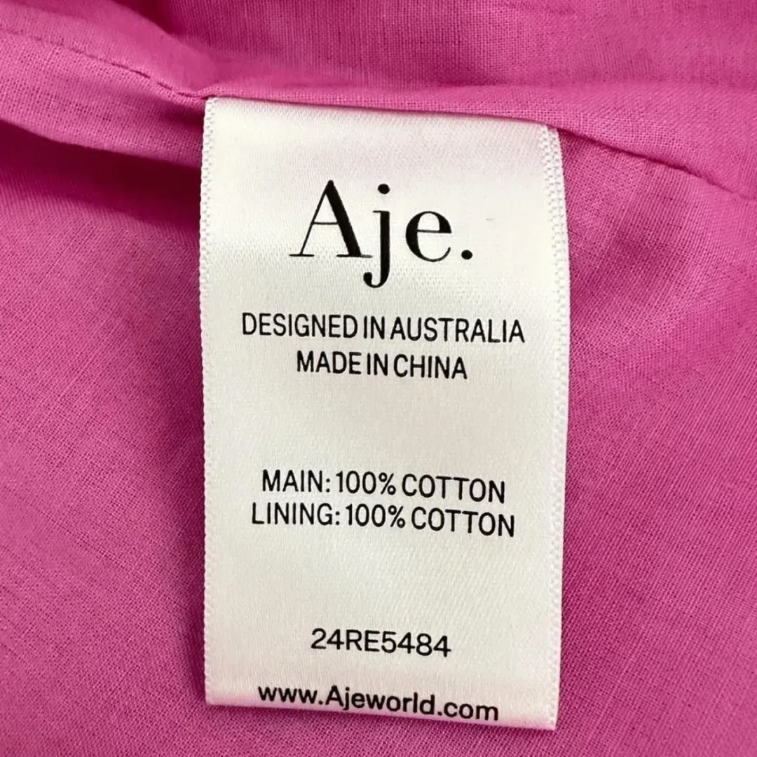 Aje Flora Midi Dress in Muted Fuchsia size 16 for rent on The Volte - main image