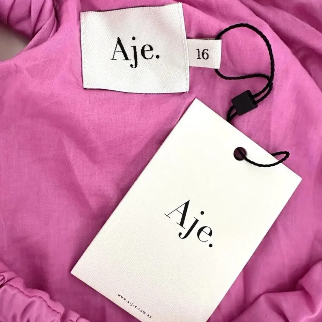 Aje Flora Midi Dress in Muted Fuchsia size 16 for rent on The Volte - main image