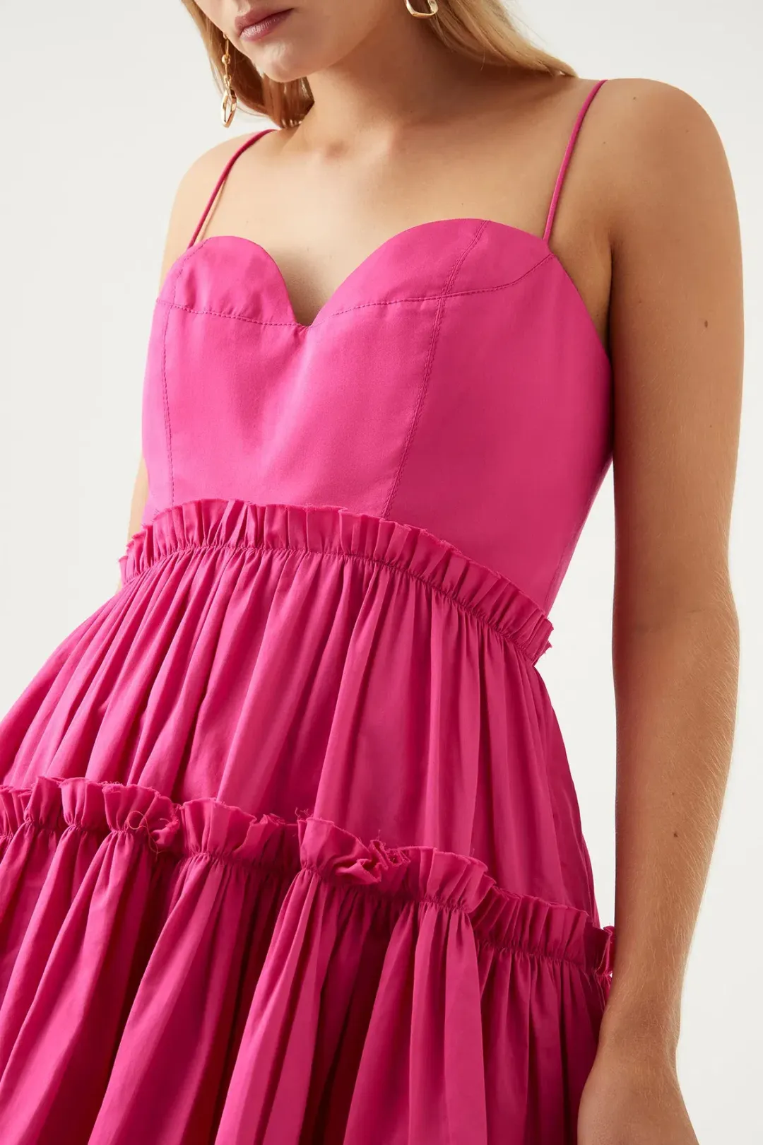 Aje Maya Tiered Mini Dress in Fuchsia size 8 for rent on The Volte - main image