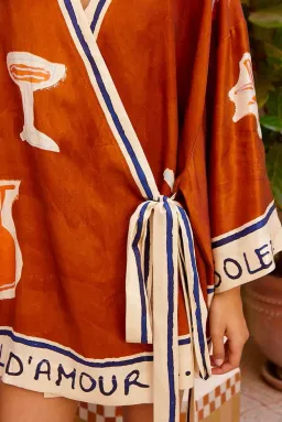 ALEMAIS Soleil D'Amour Printed Wrap Mini Dress Rust Size 8 AU for rent on The Volte - image 7