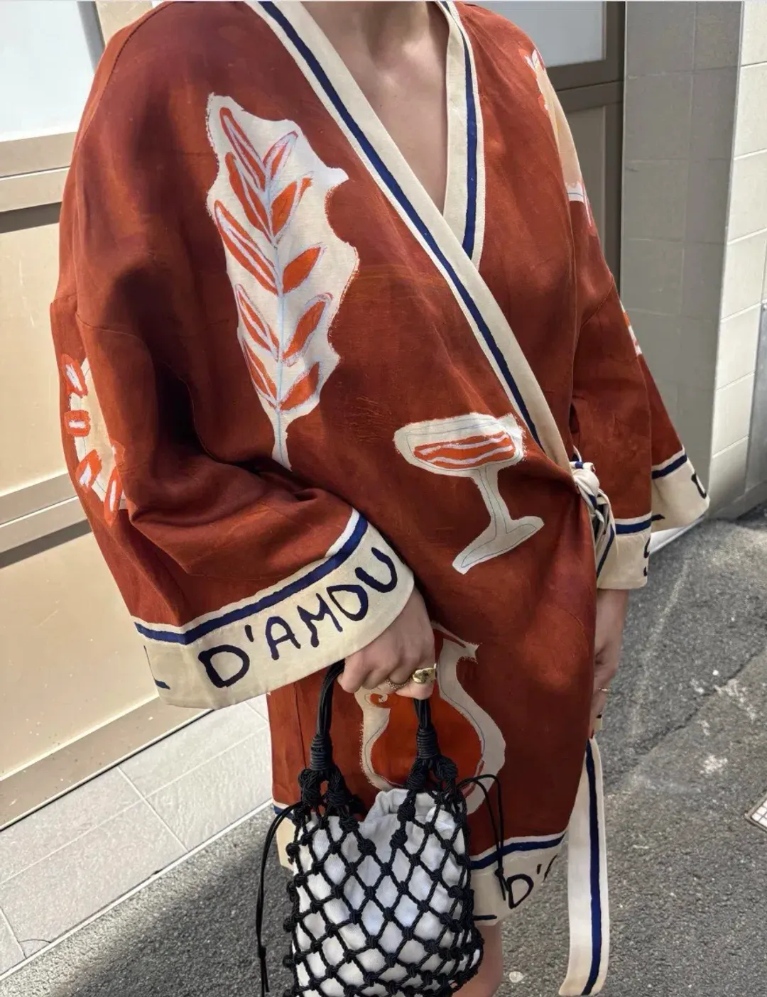 ALEMAIS Soleil D'Amour Printed Wrap Mini Dress Rust Size 8 AU for rent on The Volte - main image