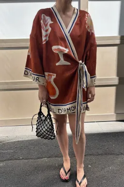 ALEMAIS Soleil D'Amour Printed Wrap Mini Dress Rust Size 8 AU for rent on The Volte - image 1