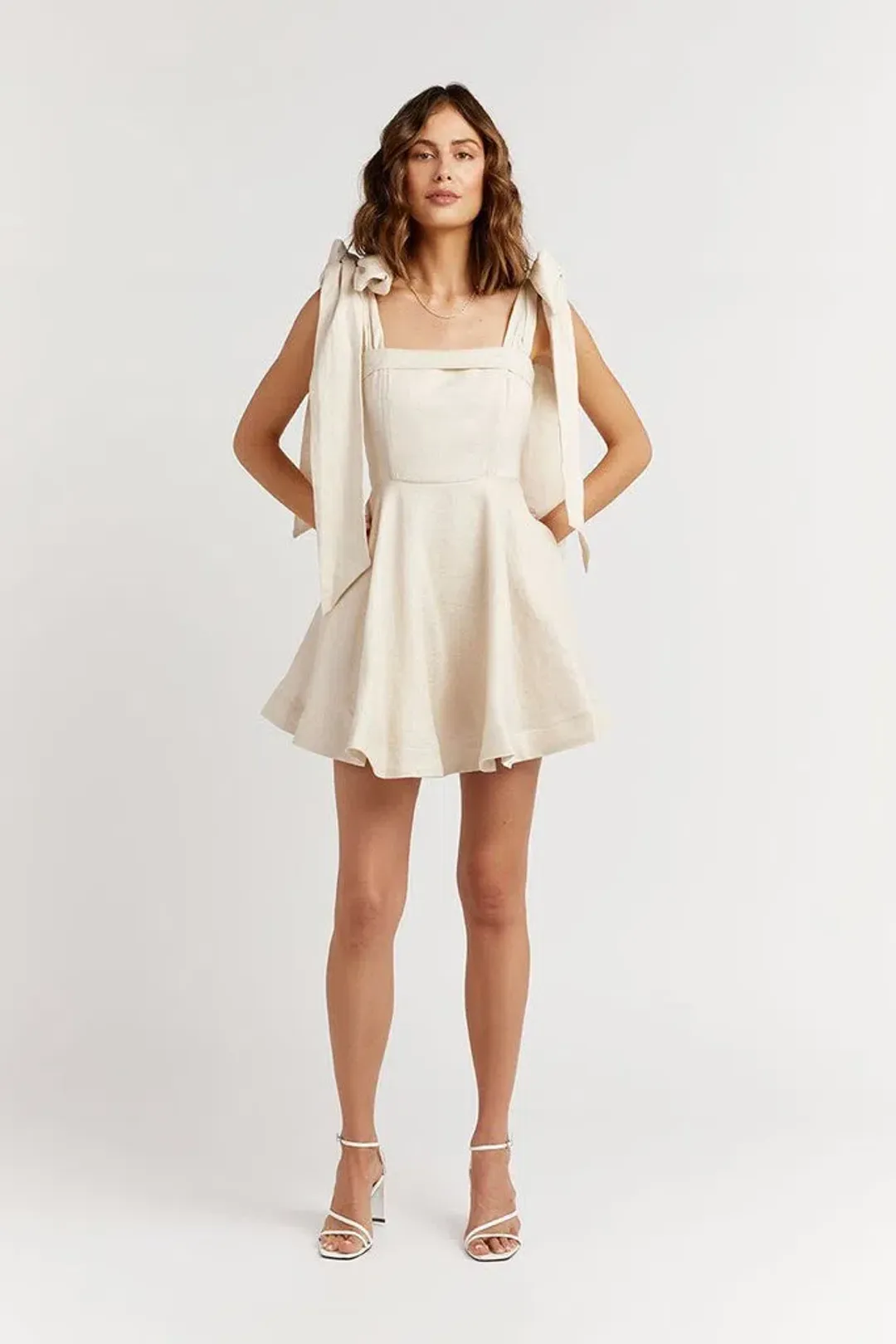 Dissh Aisle Pearl Linen Bow Mini Dress Cream Size 8 for rent on The Volte - main image