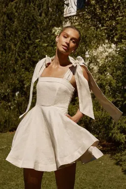 Dissh Aisle Pearl Linen Bow Mini Dress Cream Size 8 for rent on The Volte - image 1