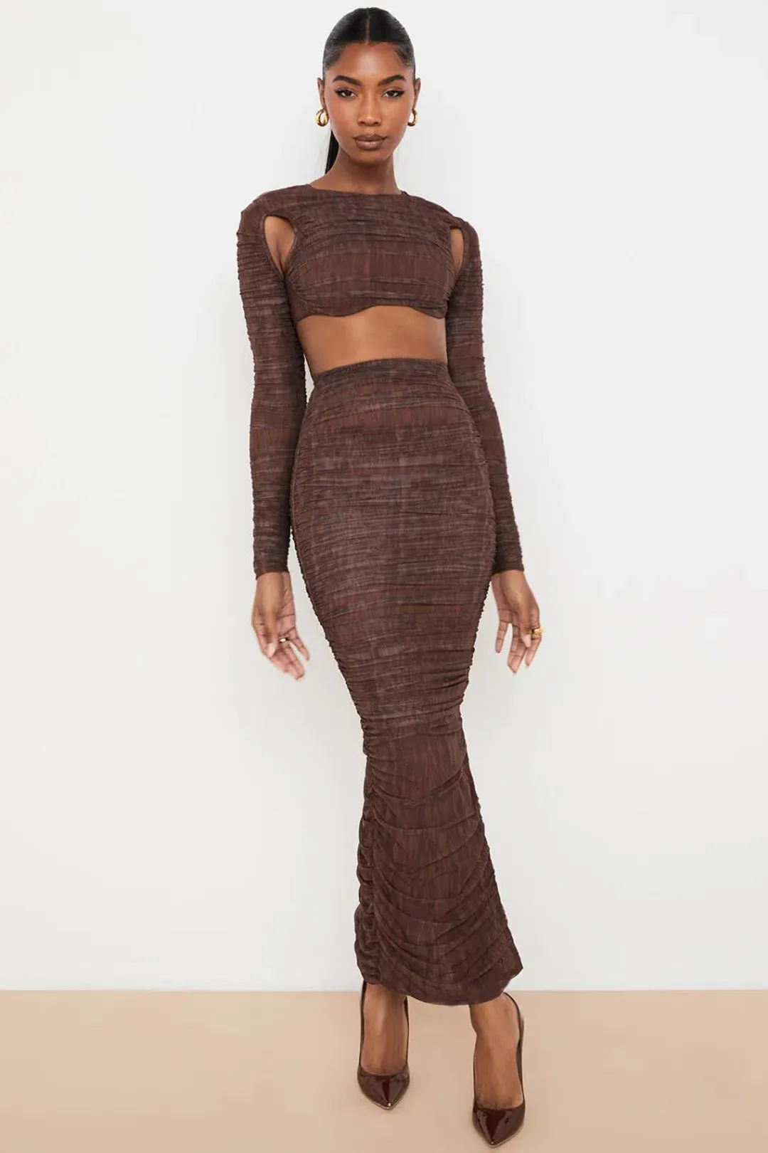 House of CB Blythe Chocolate Print Ruched Mesh Cut Out Cropped Top & Laverne Chocolate Print Ruched Maxi Skirt Brown Size 6 for rent on The Volte - main image