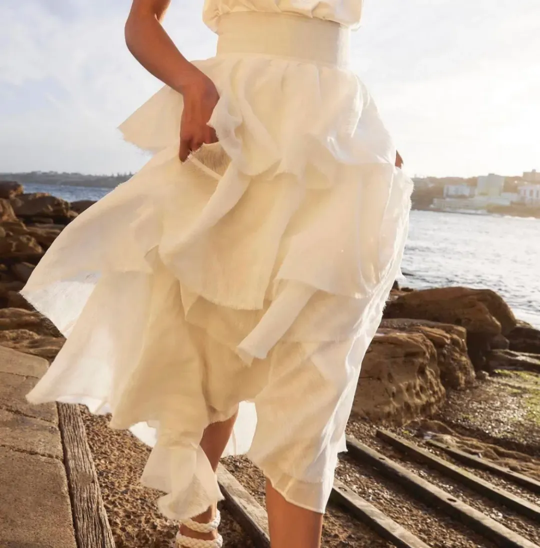 Aje Medina Tiered Midi Skirt White Size 12 for rent on The Volte - main image