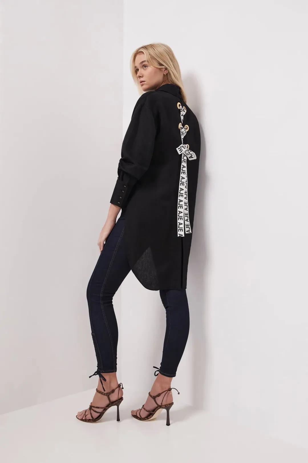 Aje Virtuous Lace-Up Longline Shirt In Black Size 10 for rent on The Volte - main image