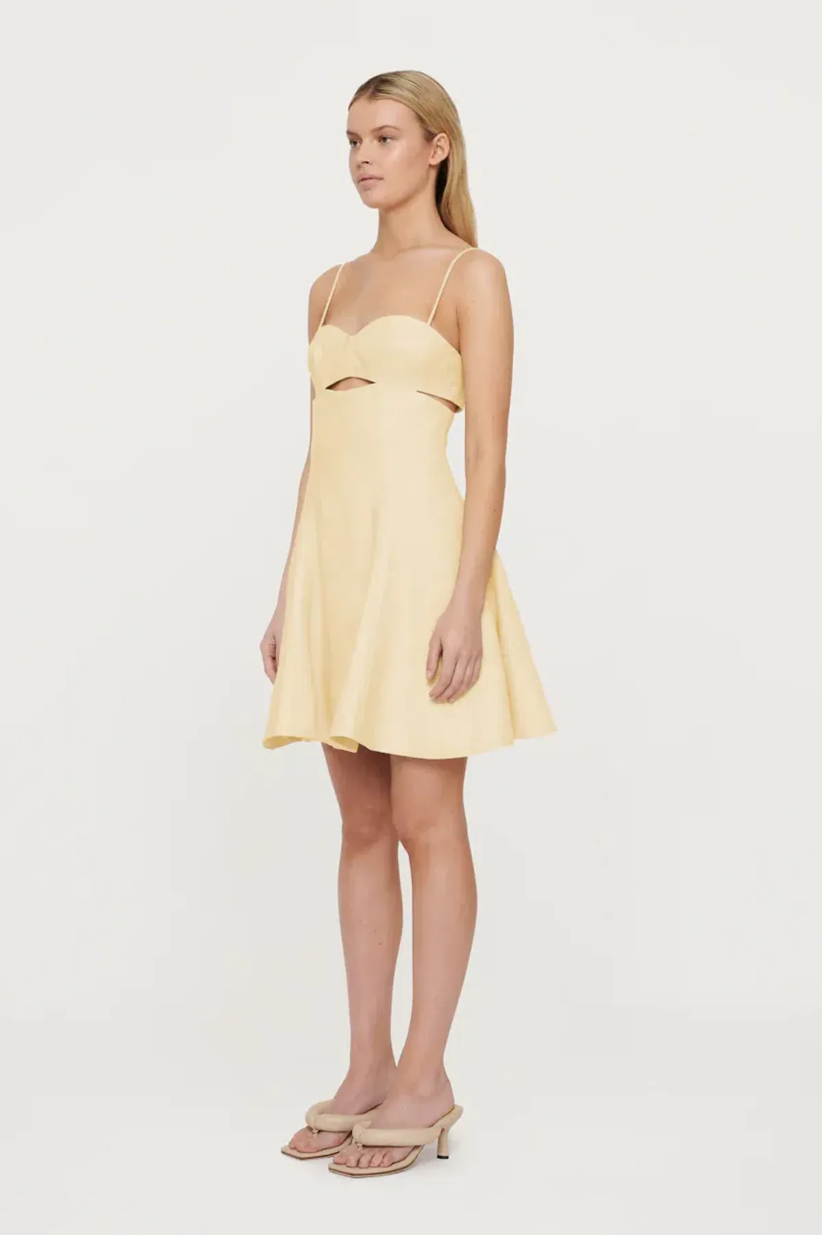 Clea Paige Stitch Mini Dress Yellow Size 8 for rent on The Volte - main image