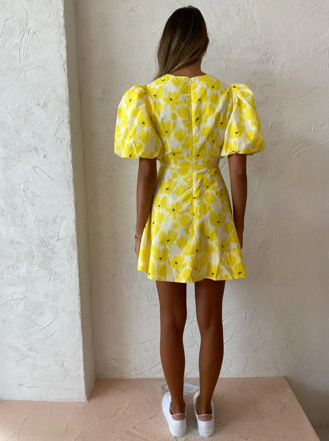 By Nicola Dahlia Ring Detail Mini Dress in Canary Blossom Size 8 for rent on The Volte - main image
