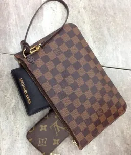 Louis Vuitton Neverfull Damier Wristlet for rent on The Volte - image 2