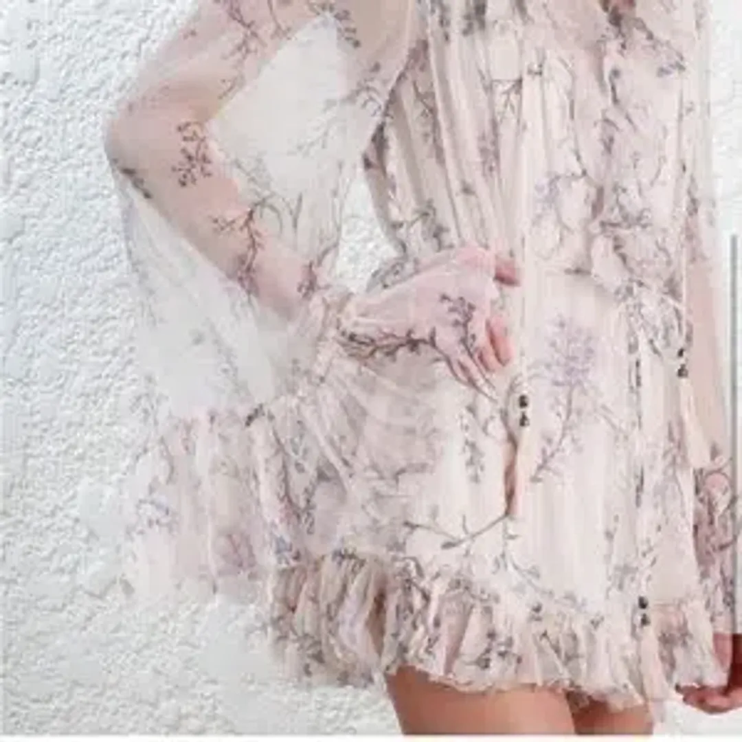 Zimmermann Paradiso Floating Floral Playsuit Pale Pink Size 0 / AU 8 for rent on The Volte - main image