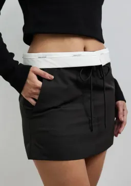 Camilla and Marc Conrad Mini Skirt Black Size 8 for rent on The Volte - image 2