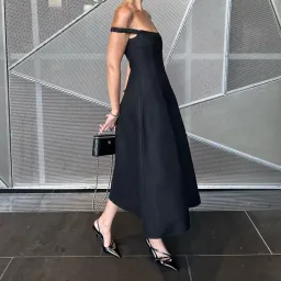 Khaite NY black midi dress for rent on The Volte - image 1