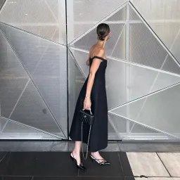 Khaite NY black midi dress for rent on The Volte - image 4