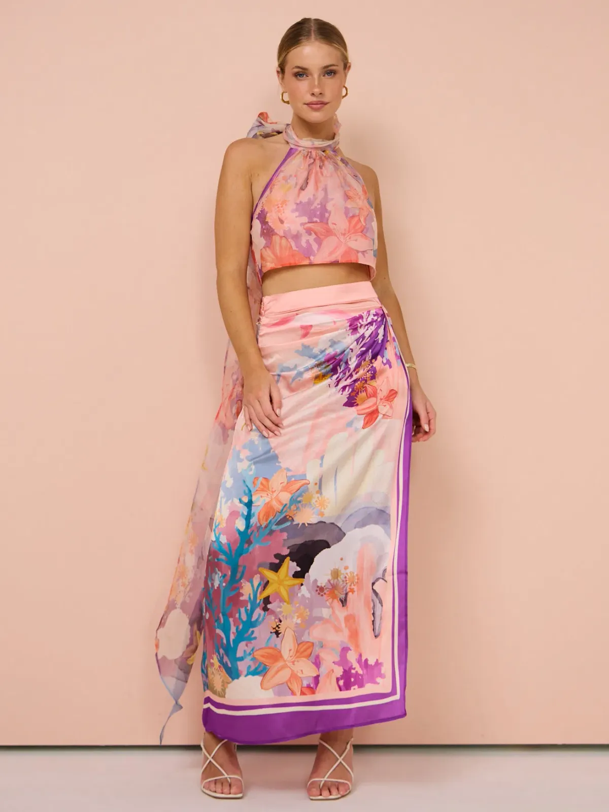 Leo Lin Evie Halter Bow Tie Top and Estella Wrap Midi Skirt in Neptune Print in Coral Set Size 6 for rent on The Volte - main image