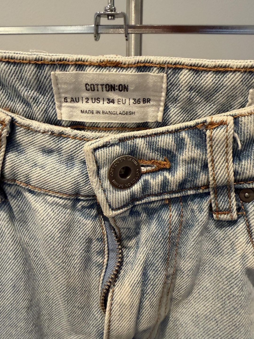 Cotton On Women's Straight Leg Ripped Jeans Size 6 Light Blue for rent on The Volte - main image