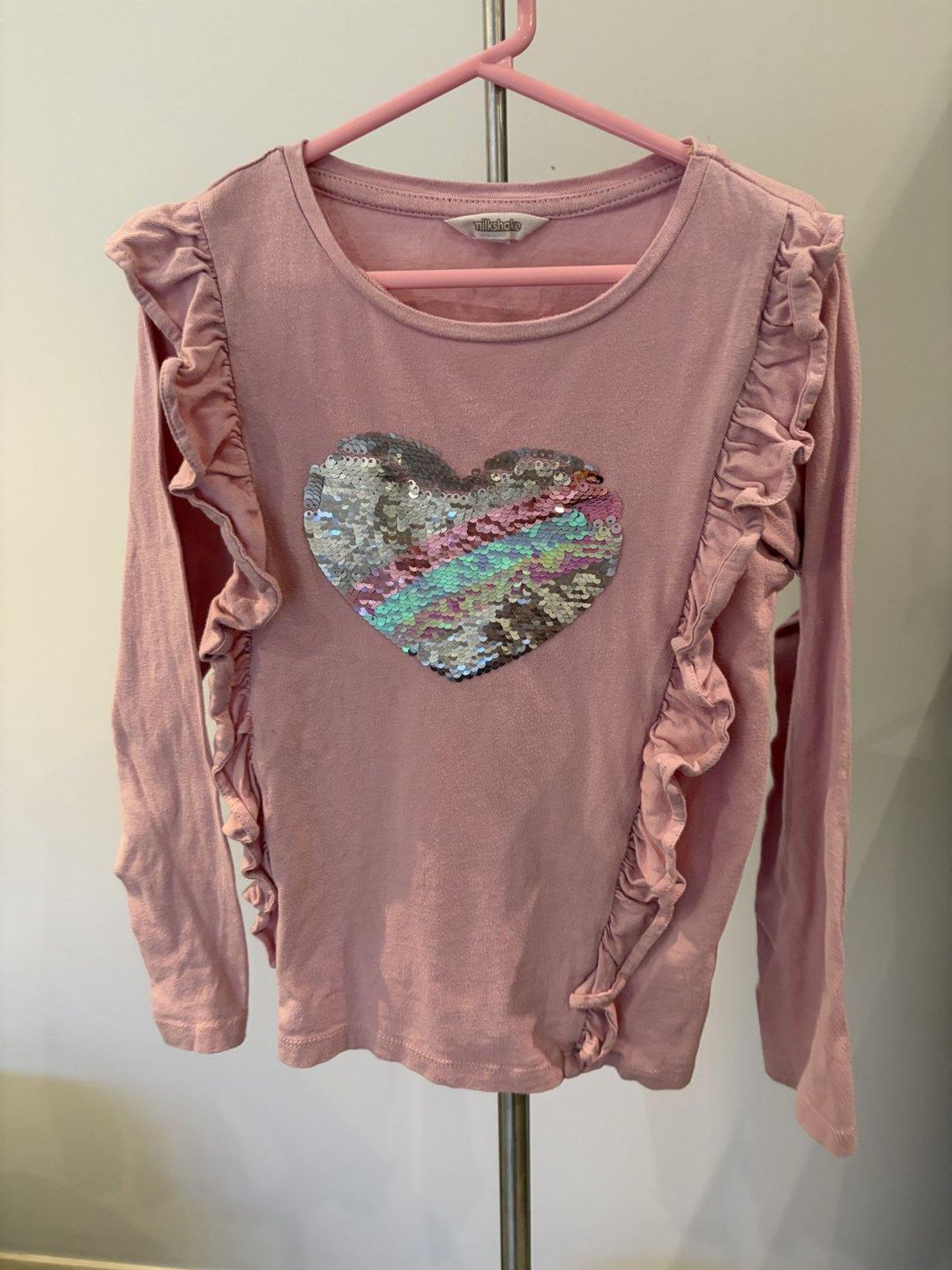 Milkshake Girls Sequin Heart Ruffle Long Sleeve Top Size 8 Pink for rent on The Volte - main image