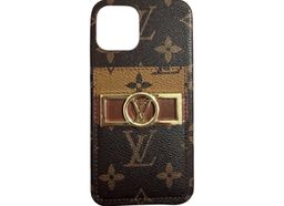 Louis Vuitton iPhone 12 Monogram Case Card Holder for rent on The Volte - image 1