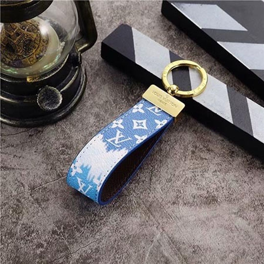 Louis Vuitton Monogram Wristlet Key Ring Blue Gold Hardware for rent on The Volte - main image
