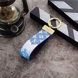 Louis Vuitton Monogram Wristlet Key Ring Blue Gold Hardware for rent on The Volte - image 1