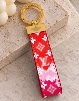Louis Vuitton Monogram Wristlet Key Ring Pink Orange Ombre for rent on The Volte - image 1