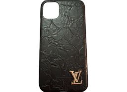 Louis Vuitton Monogram Embossed iPhone 11 Phone Case – Black with Rose Gold LV Logo for rent on The Volte - image 1