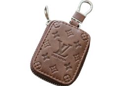 Brown Embossed AirPod / Earbud Zip Case & Keyring Charm 🤎 for rent on The Volte - image 1