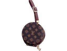 Designer Inspired Brown Monogram Round AirPod / Earbud Case & Bag Charm 🤎 for rent on The Volte - image 1