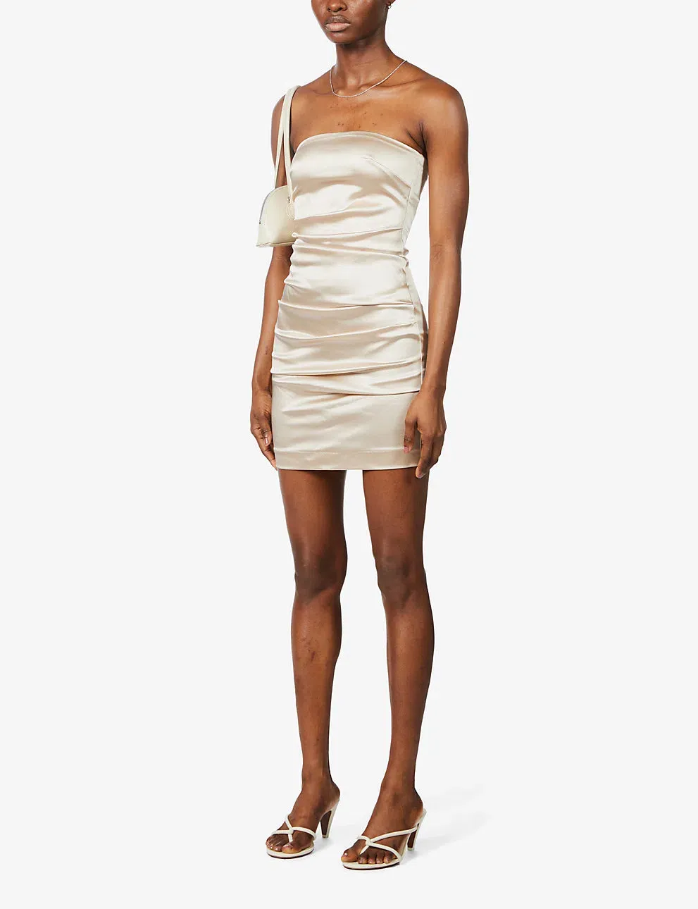 the lia mini dress champagne To order this champagne crystal mini dress DM @reineecouture A structured corset mini crafted in luminous champagne tone, featuring wide embellished straps and precision hand-placed crystal draping across the bodice. The sculpted